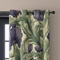 Close-up of purple iris william morris style curtain grommets on a black rod