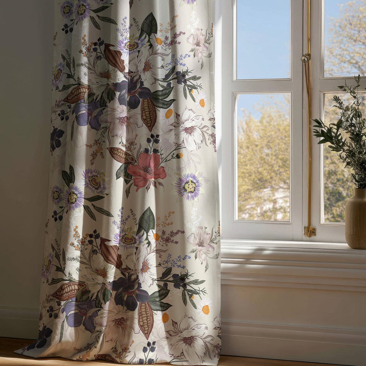 Full-length purple jacobean floral curtain draping to a wooden floor