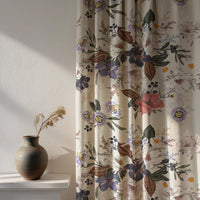 Soft daylight through a purple jacobean floral curtain