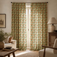 Red floral vine curtains in a living room