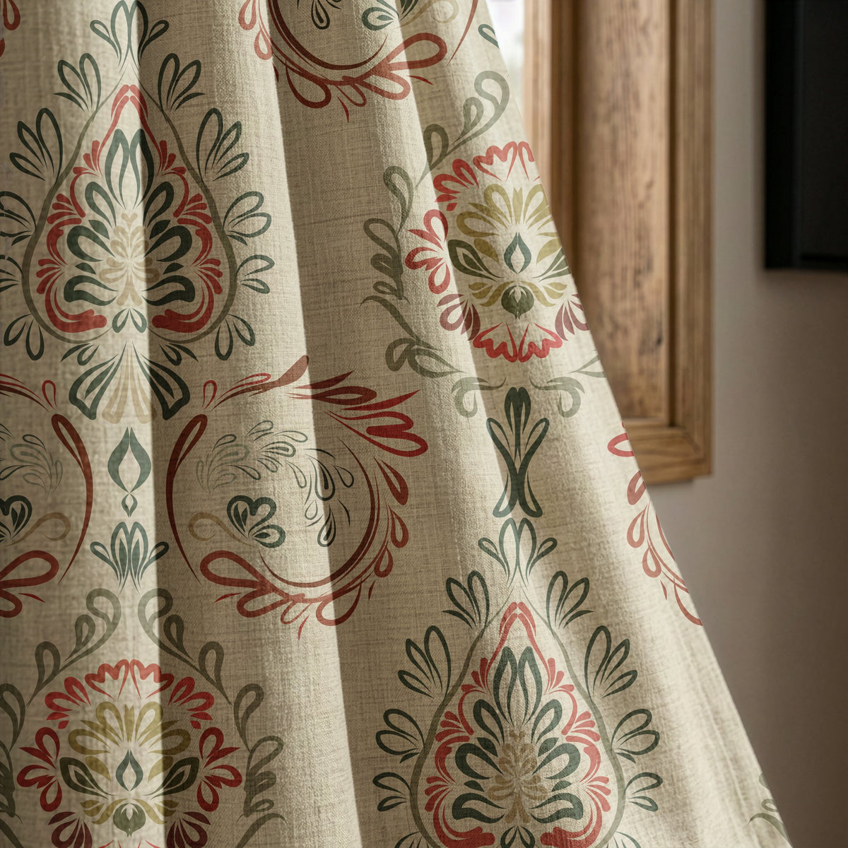 Red and green folk damask curtain panel beside a rustic wooden window