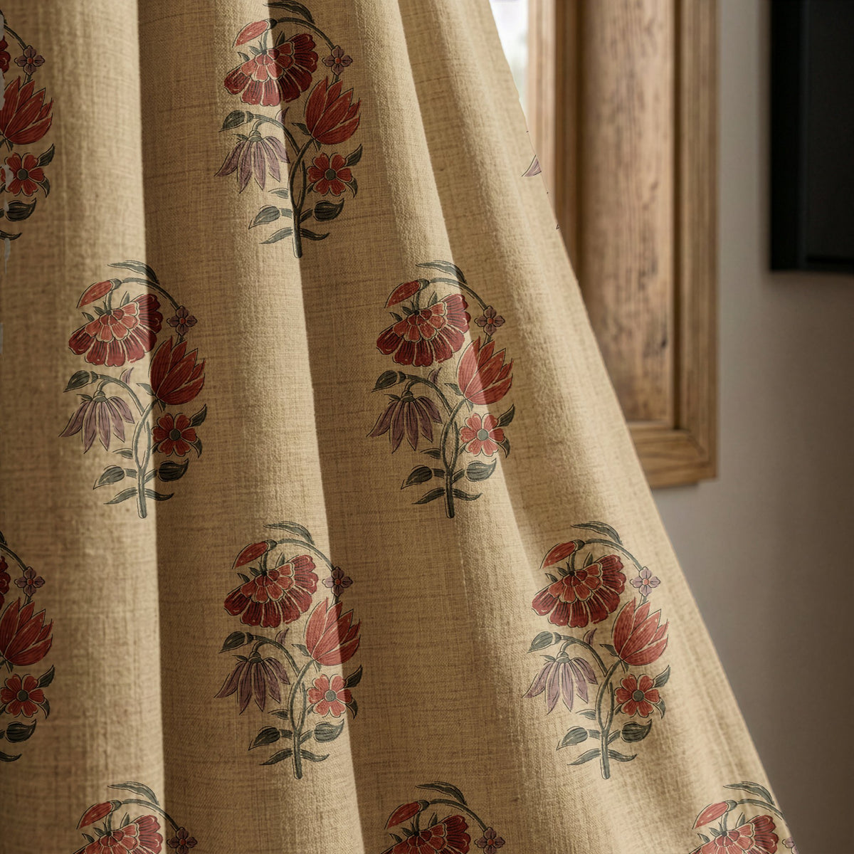 Red poppy block print curtain panel beside a rustic wooden window