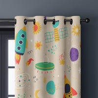 Close-up of retro rocket space kids curtain grommets on a black rod