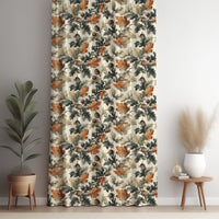 Rust and green oak leaf curtain panel against a white wall