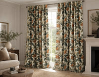 Rust and green oak leaf curtains in a living room