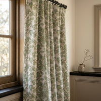 Sage eucalyptus leaf curtains in a warm living room