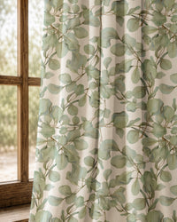 Pair of sage eucalyptus leaf curtains at an arched window