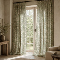 Sage eucalyptus leaf curtain on a black rod by a window
