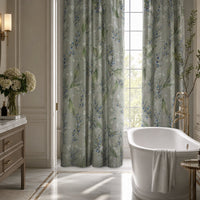 Pair of sage green lavender sprig curtains in a bedroom