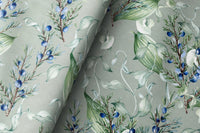 Sage green lavender sprig curtains framing a tall window