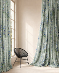 Sage green lavender sprig curtains in a sunlit bedroom