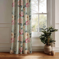 Sage green peony floral curtain panel hanging by a white window