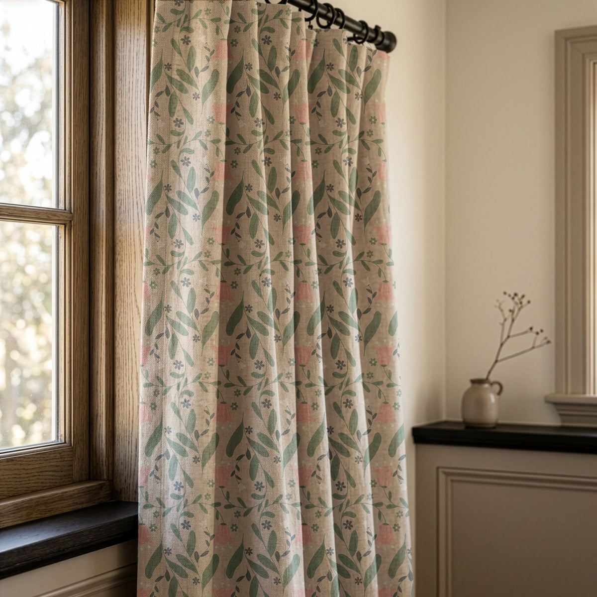 Sage and pink ditsy floral curtains in a warm living room