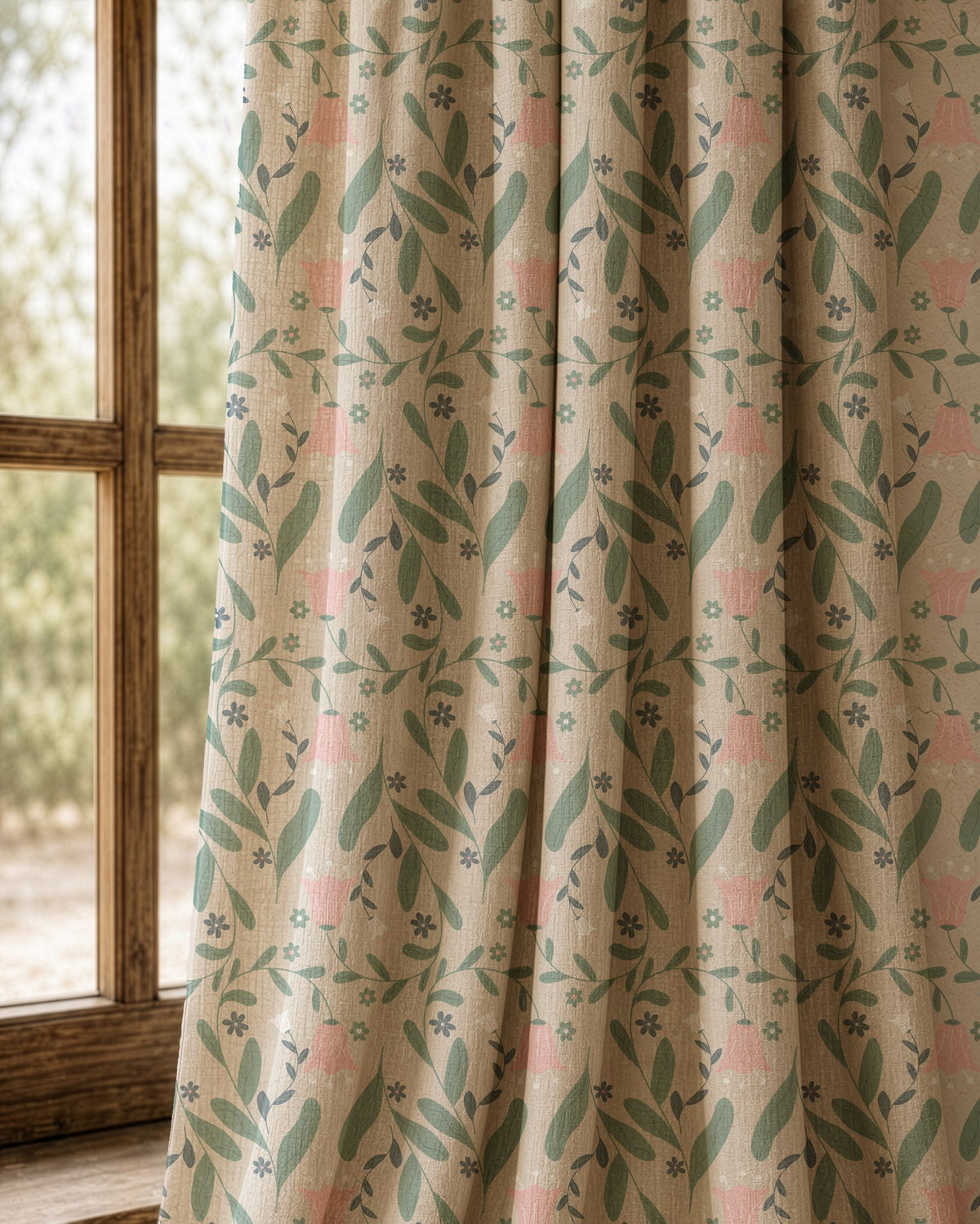 Pair of sage and pink ditsy floral curtains at an arched window