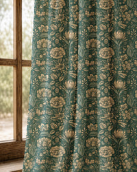 Pair of teal arts and crafts floral curtains at an arched window