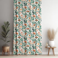 Teal and coral arts and crafts floral curtain panel against a white wall