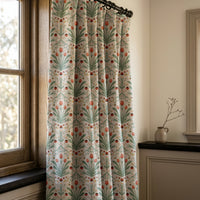 Teal folk tulip curtains in a warm living room