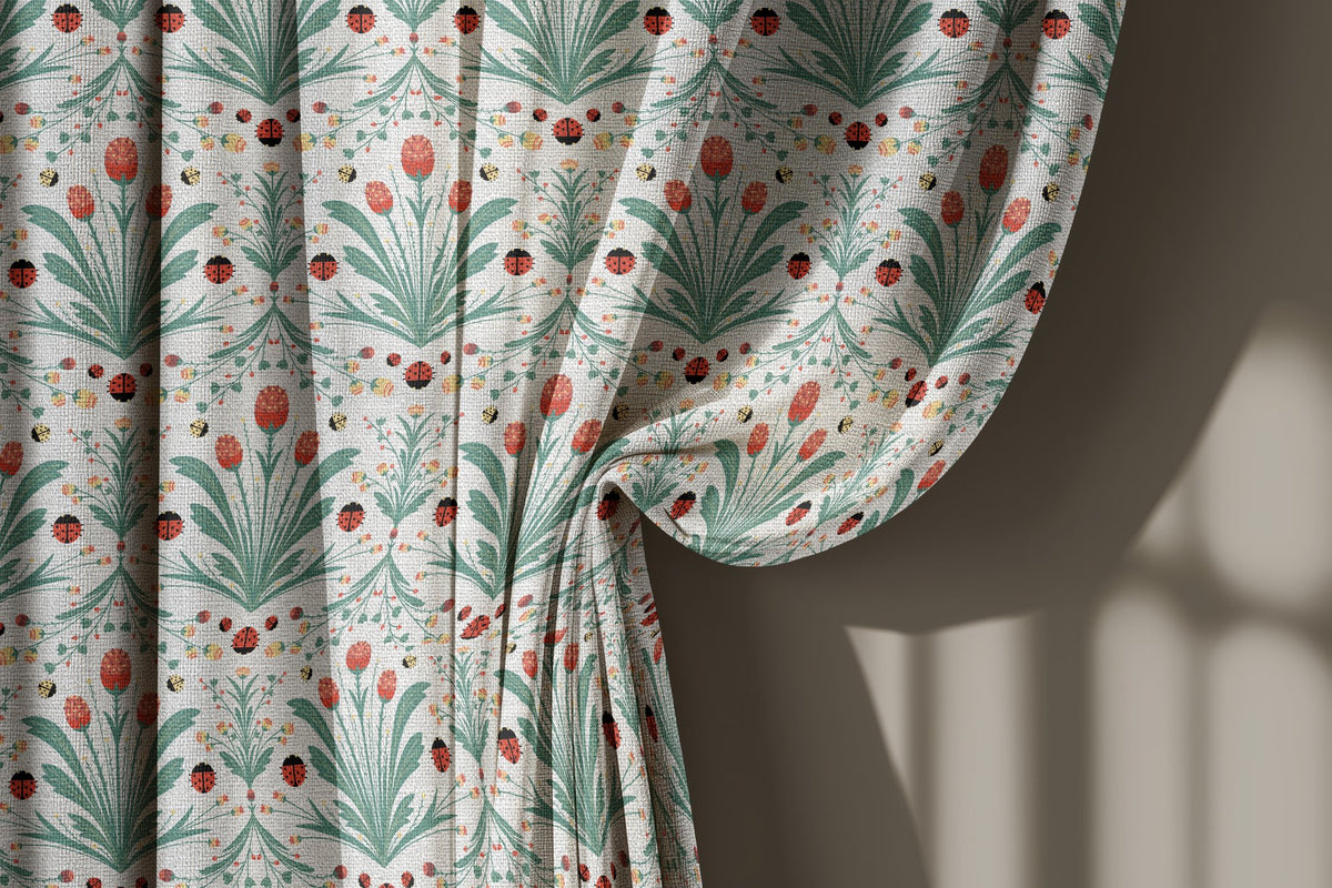 Teal folk tulip curtain gathered to one side