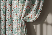 Teal folk tulip curtain gathered to one side