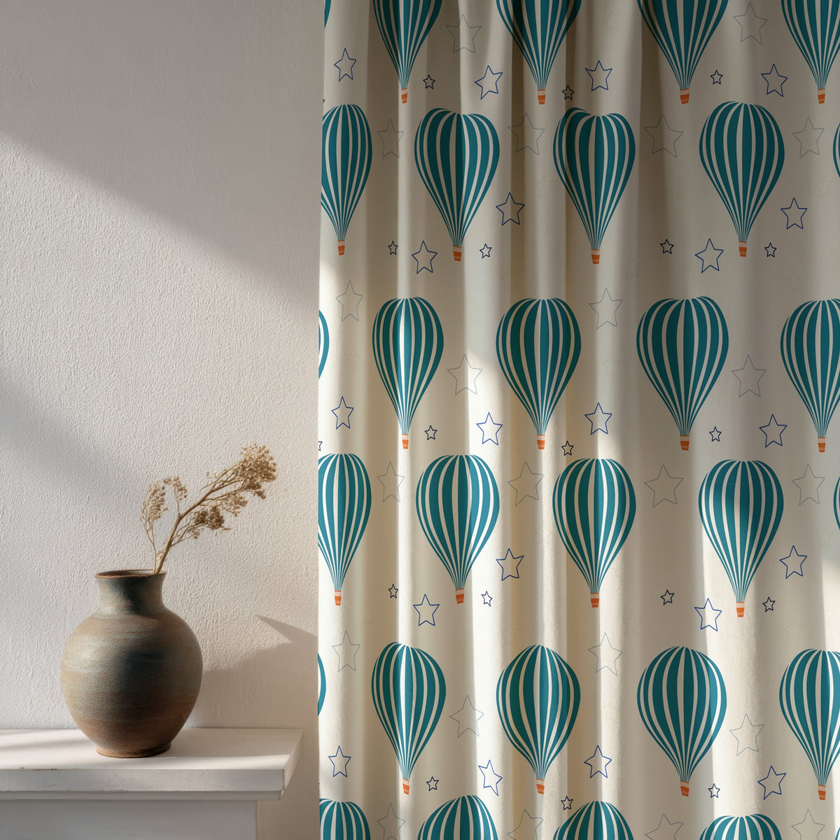 Soft daylight through a teal hot air balloon nursery curtain