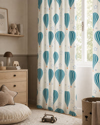 Teal hot air balloon nursery curtains styled with neutral decor