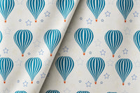 Teal hot air balloon nursery curtains framing a tall window