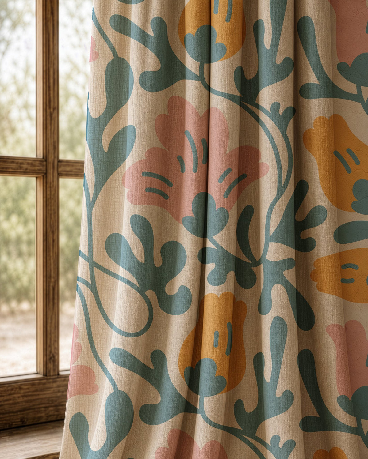 Pair of teal and pink abstract floral curtains at an arched window