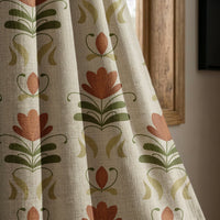 Terracotta folk tulip curtain panel beside a rustic wooden window