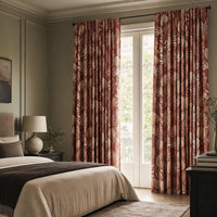 Terracotta palm leaf curtains in a bedroom