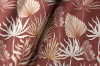 Pair of terracotta palm leaf curtains in a bedroom