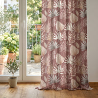 Terracotta palm leaf curtain at glass patio doors