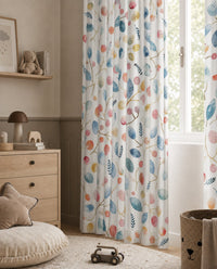 Pair of watercolor leaf and berry curtains in a child's bedroom