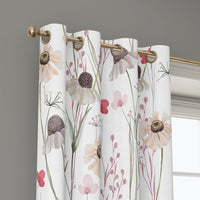 Grommet top of a white minimal wildflower curtain on a brass rod
