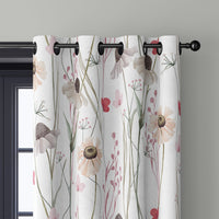 Close-up of white minimal wildflower curtain grommets on a black rod