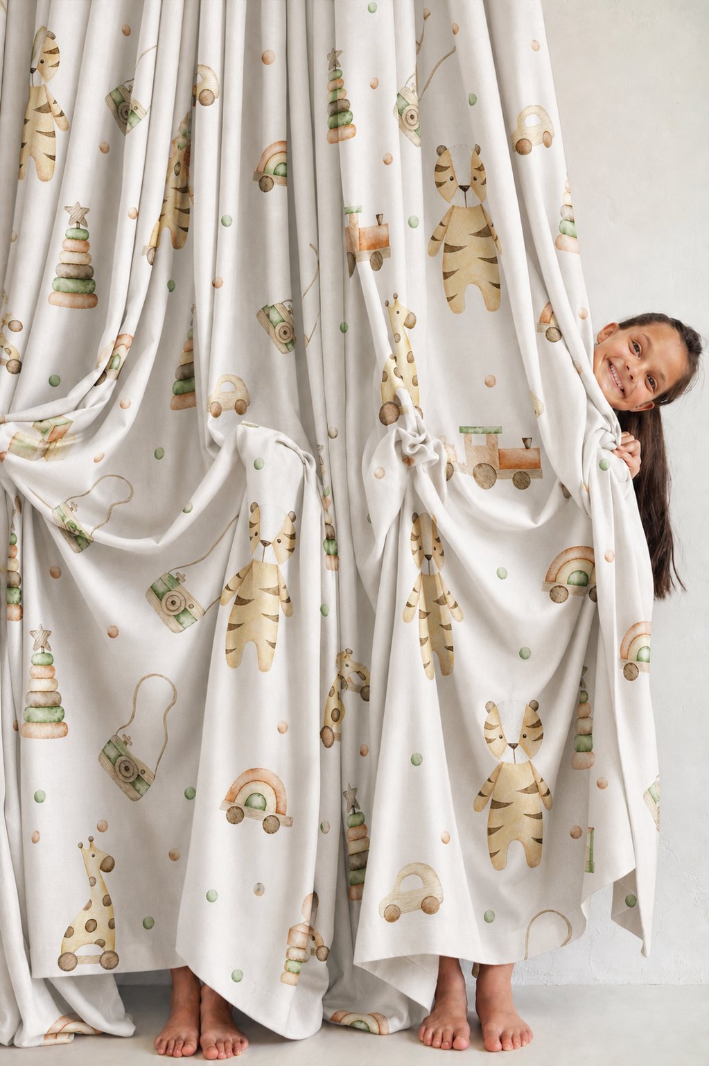 Wooden toy and giraffe nursery curtains styled with neutral decor