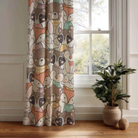 Full-length woodland animal print curtain at a window