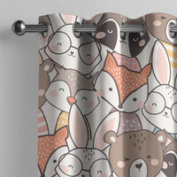 Woodland nursery curtain on a grommet rod with fox, bear and bunny faces